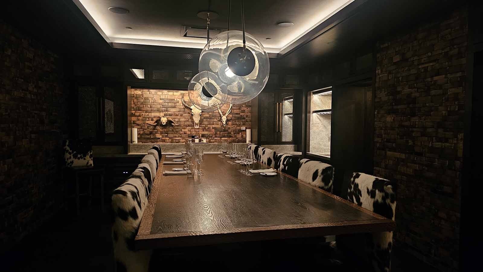 Among the secret areas of Brush Creek Ranch is this dining area, with rawhide chairs.