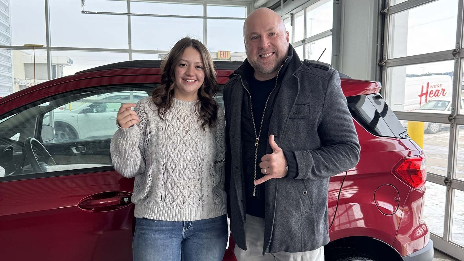 Bryan Pedersen and Gracie, a Cheyenne high school student who slid through an intersection on ice and crashed into Pedersen's Escalade. Instead of getting mad, he raised nearly $15,000 to buy her a new car.