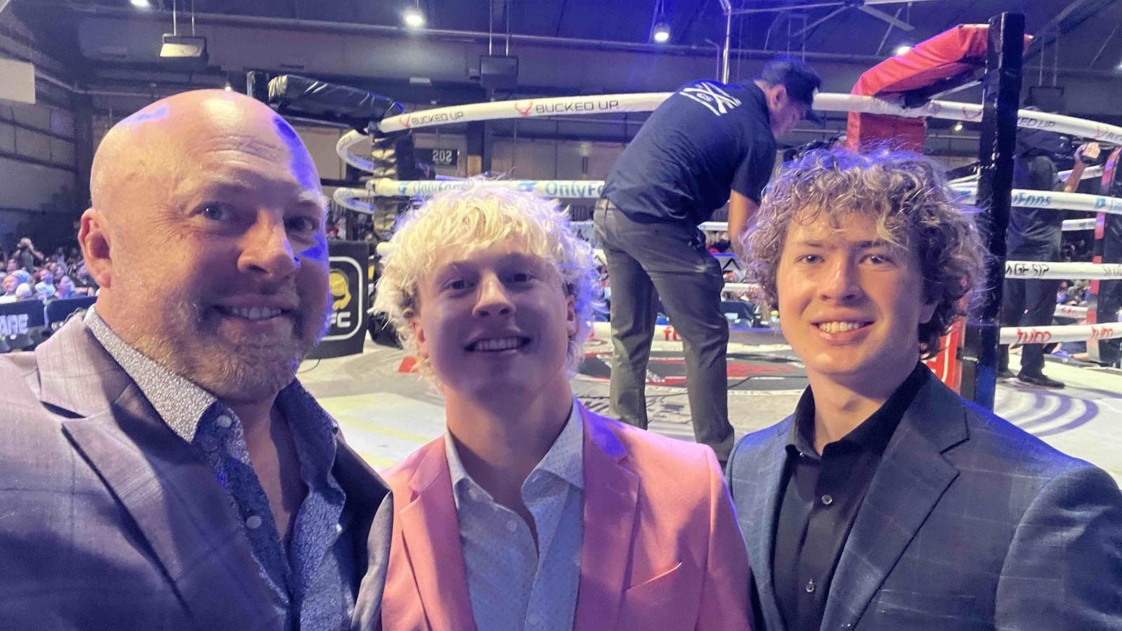 Bryan Pedersen, left, at a bare-knuckle fight with his sons Brock and Dane.