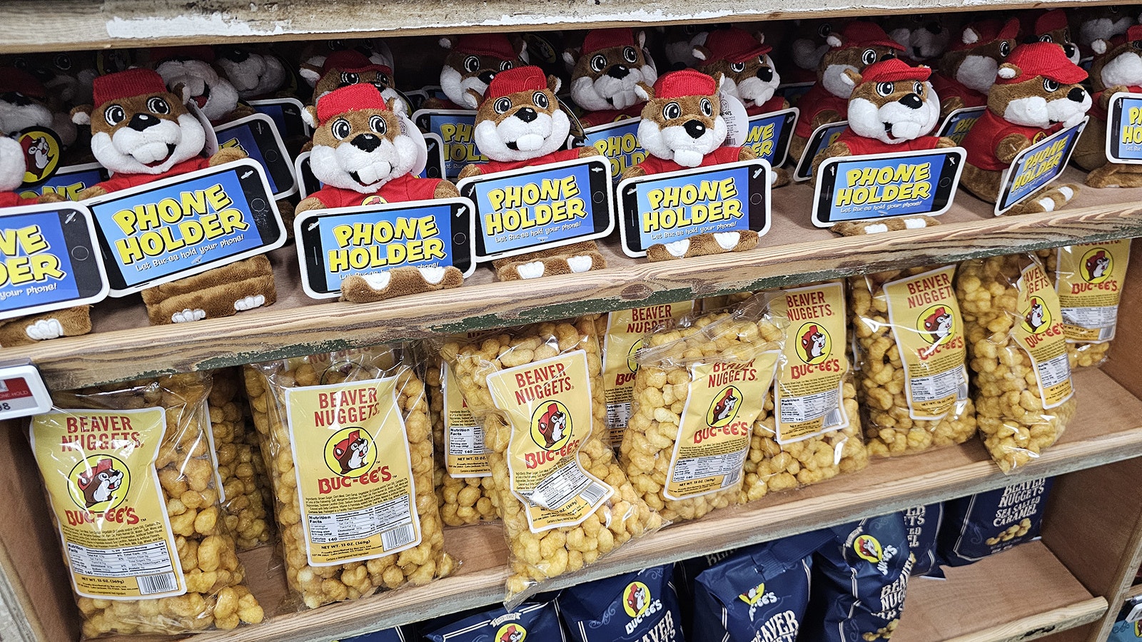 Doesn't everyone need a Buc-ee's phone holder? Certainly everyone needs a bag of Beaver Nuggets.