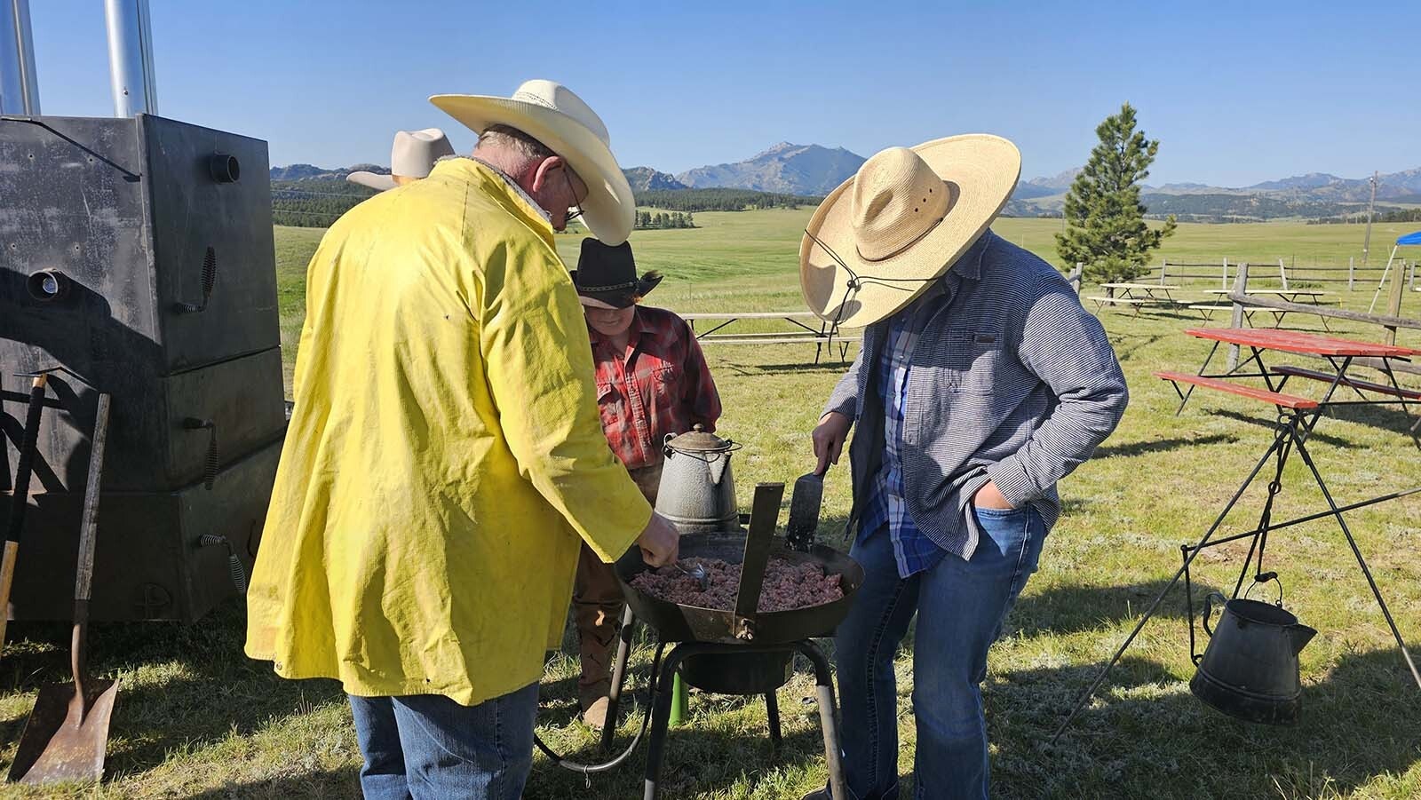 One crew focused on cooking up the sausage for the sausage gravy for the Chuckwagon breakfast before Buckboard Sunday at Estherbrook Church.