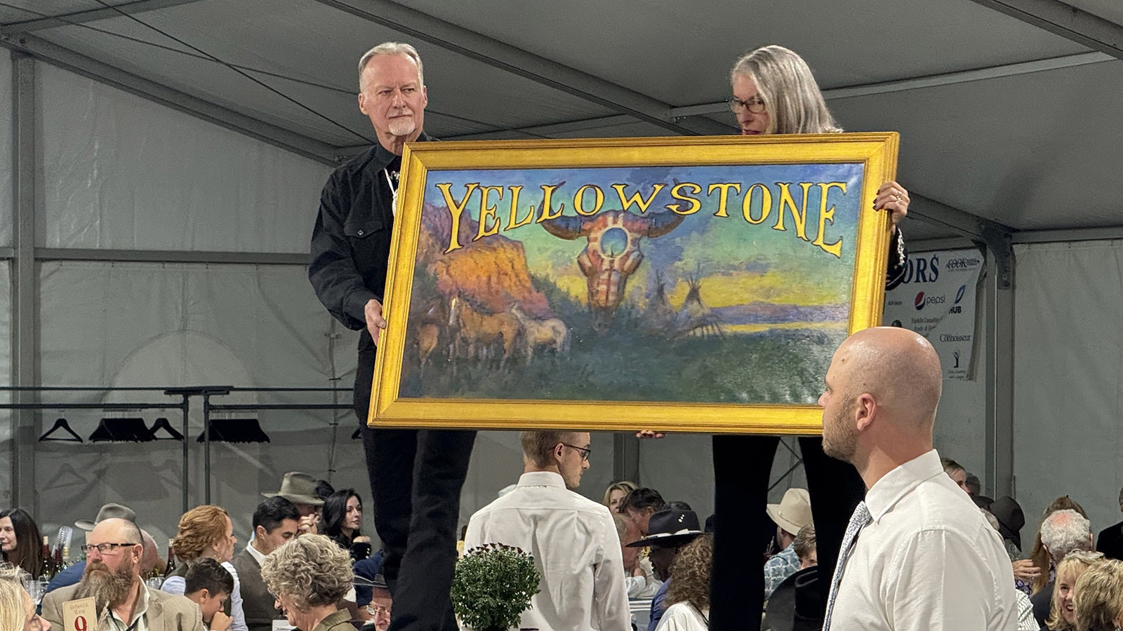 "Spirit of the Yellowstone" by Buckeye Blake on the runway. The painting sold for $7,500.