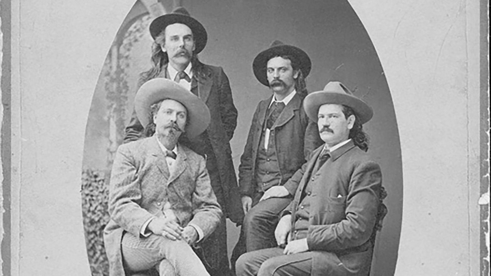 This portrait shows Buffalo Bill Cody, second from right, and Col. Frank Powell, far right, with George Powell and Will Powell.