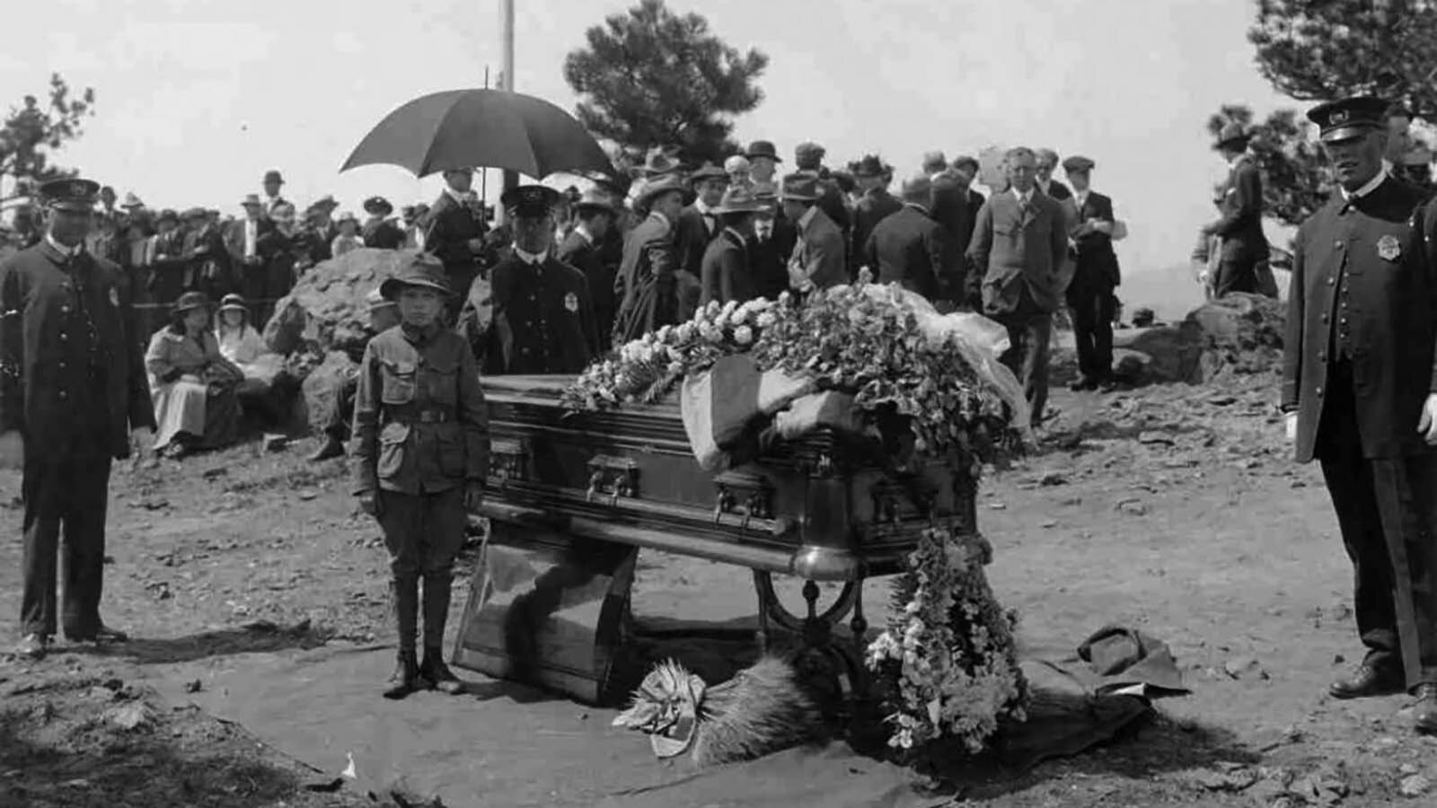 Denver Police Department officers stand guard over the casket of William F. "Buffalo Bill" Cody on June 3, 1917, on Lookout Mountain west of Denver before his burial.