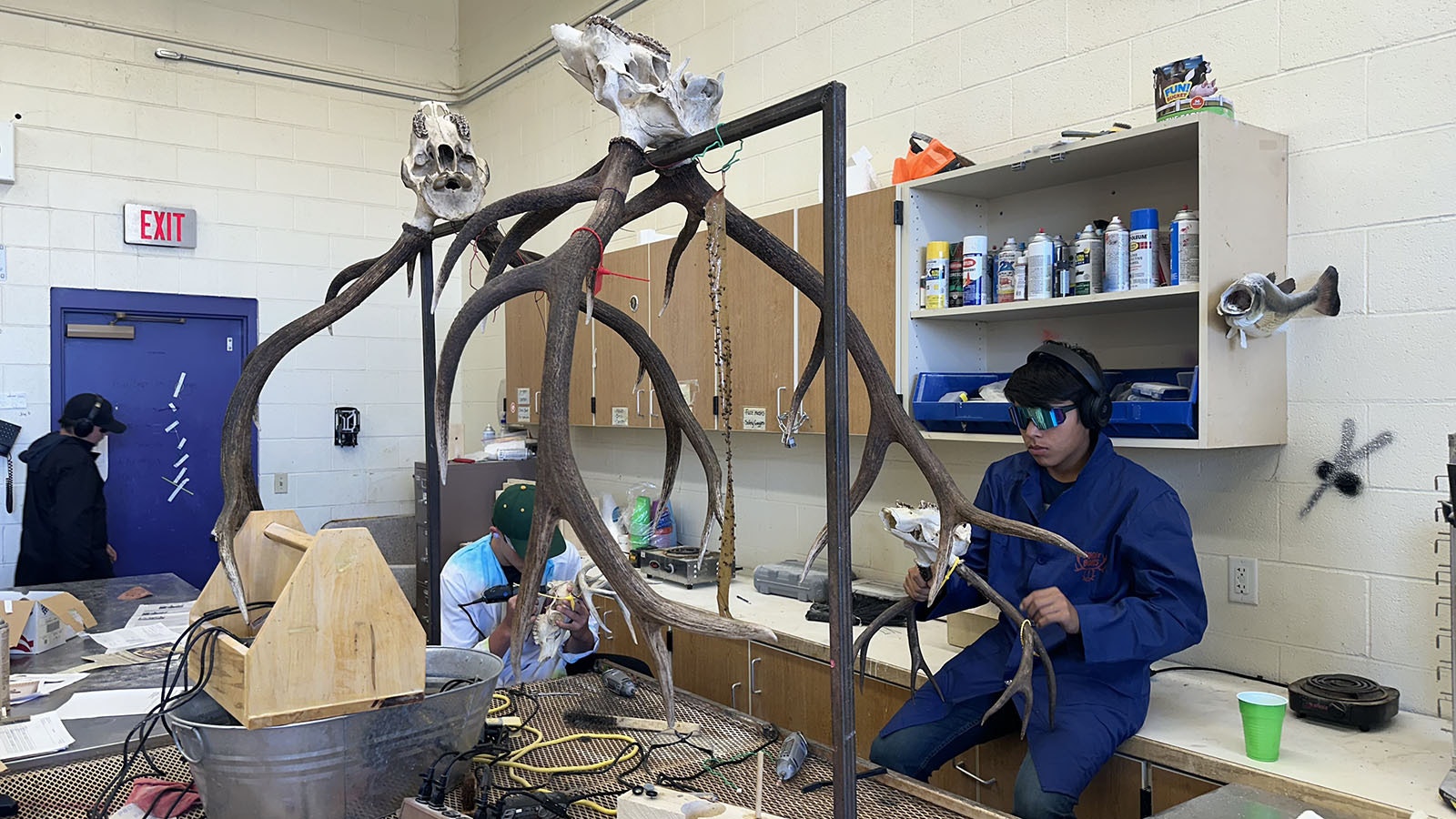 Tunk Goebel and Kalen Pogue work at the Dremel station at the Bugs ‘n Bones class at Wind River High School in Pavillion, Wyoming.