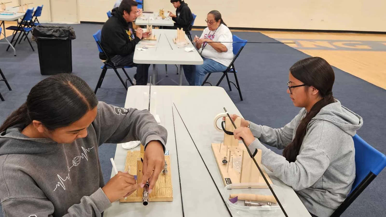 Students at Wyoming Indian High School build their own fishing rods as part of Wyoming’s new high school fly-fishing club program.