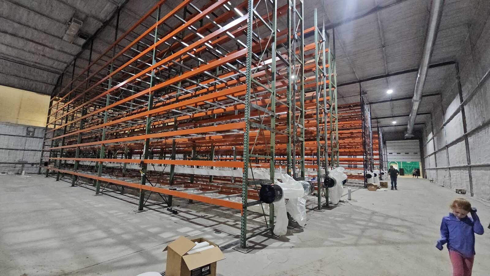These racks at Burnett Enterprises will hold large trays of sprouted grains, which will be grown for four days before being added to their dairy cattle rations.