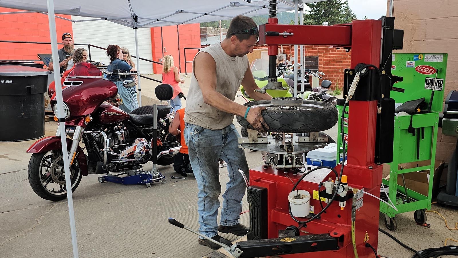 Bikes get a used tire placed on them before the burnout. After the burnout, the bike's original tire will go back on so the rallygoer is good to go again.