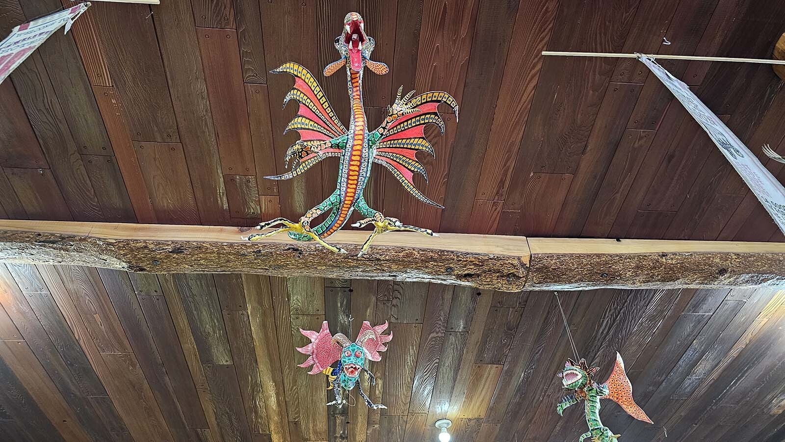 These dragons are meant to chase away nightmares and evil spirits. They seem to work, according to the store's owner, Frank Welty.