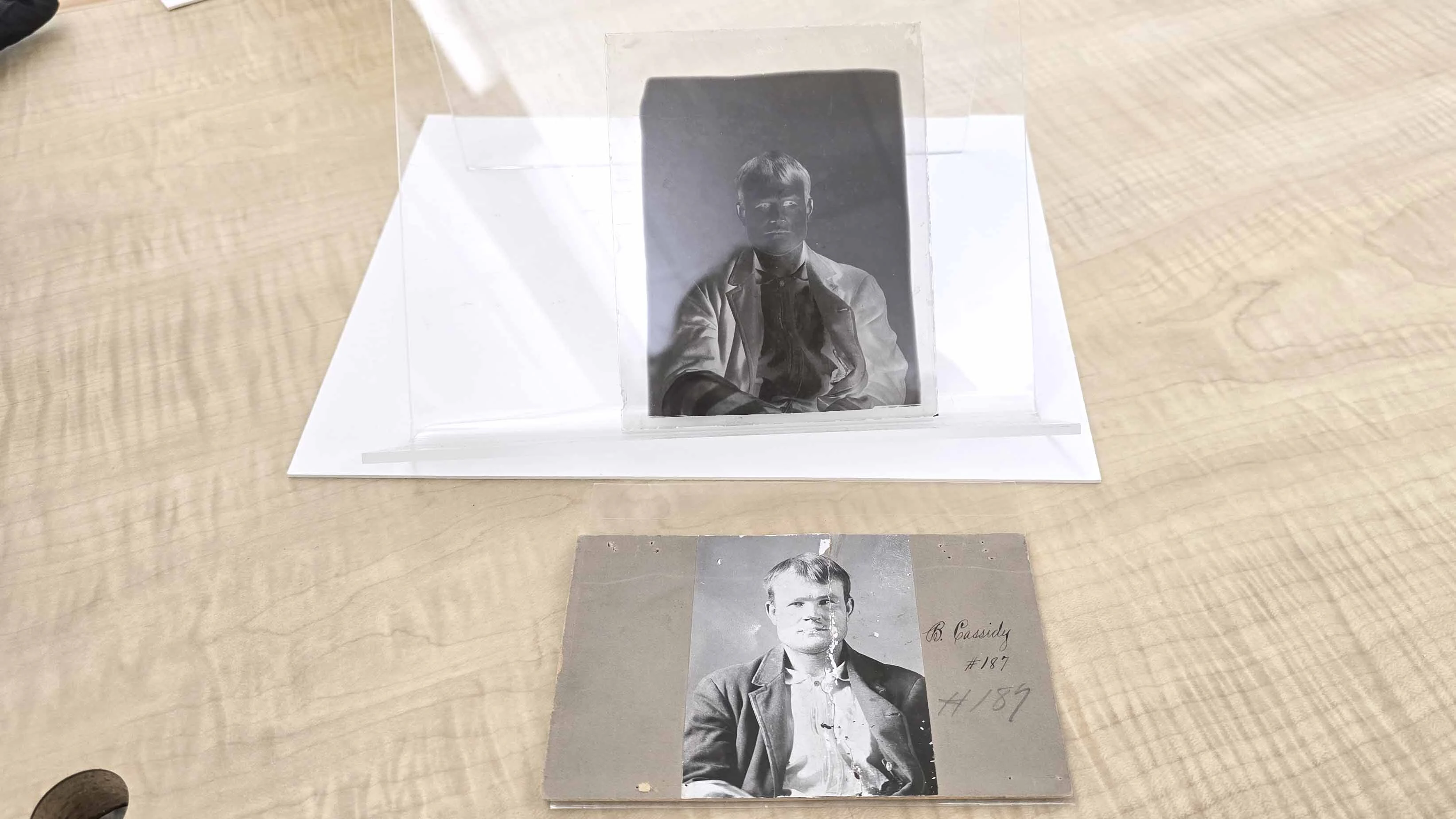 Original negative, top, with original print, held in the Wyoming State Archives.