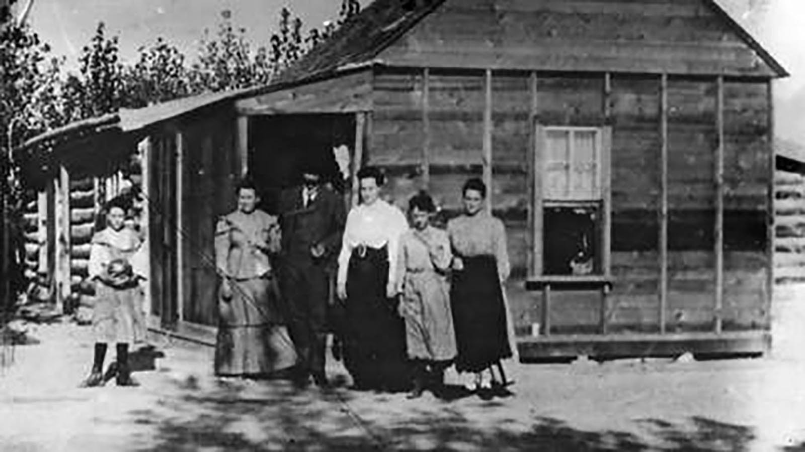 Members of the Byron Sessions family in front of their house in Byron, Wyoming, in the early 1900s. The town is named for Byron Sessions.