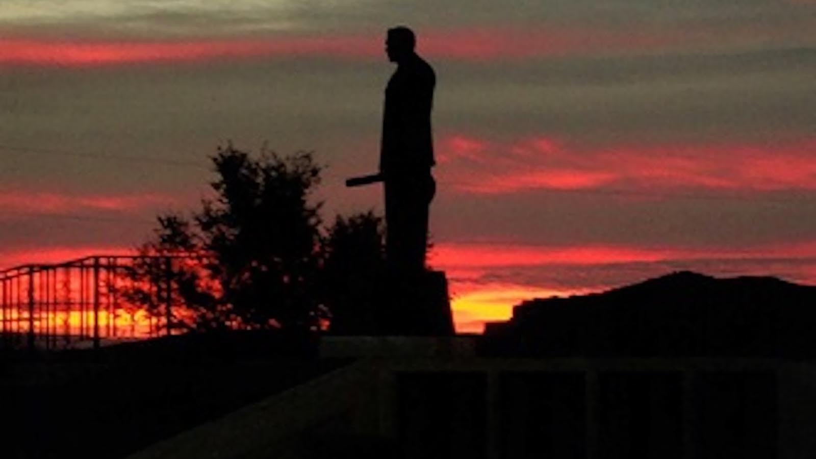 Town of Byron website photo of Byron Sessions statue during a gorgeous sunset.