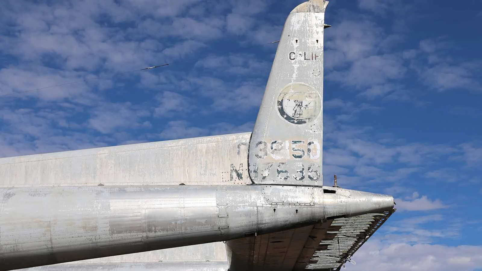 Tail numbers for the C-119 are faded but still can be made out.