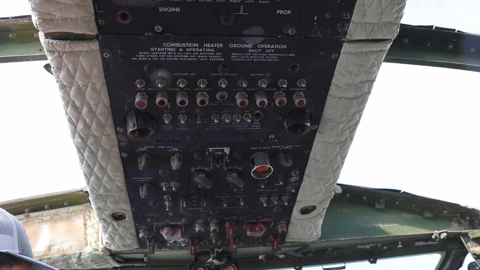 The C-119’s overhead panel of switches and indicators in the cockpit. 