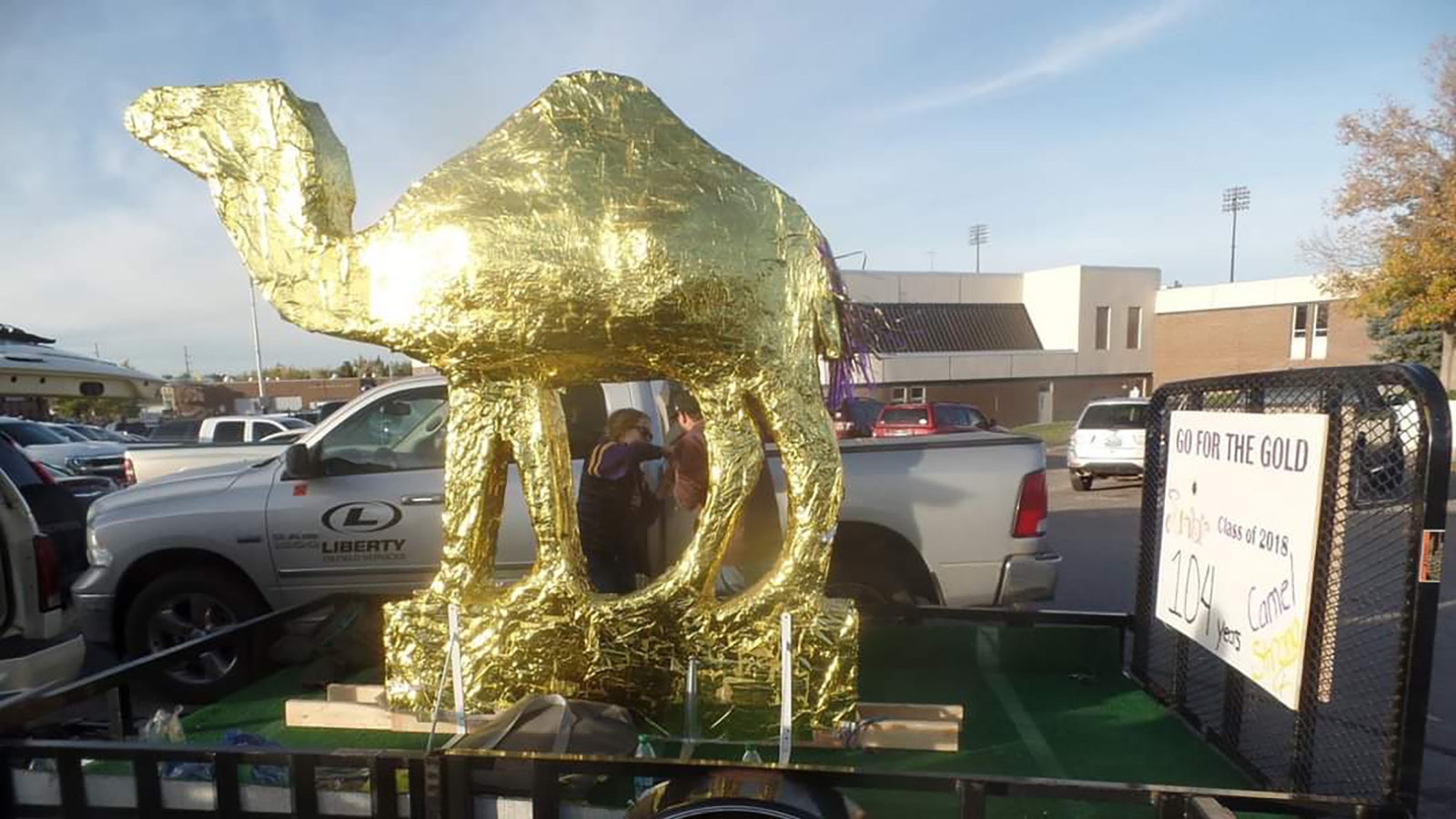 A golden CCHS Camel was featured in a school parade.