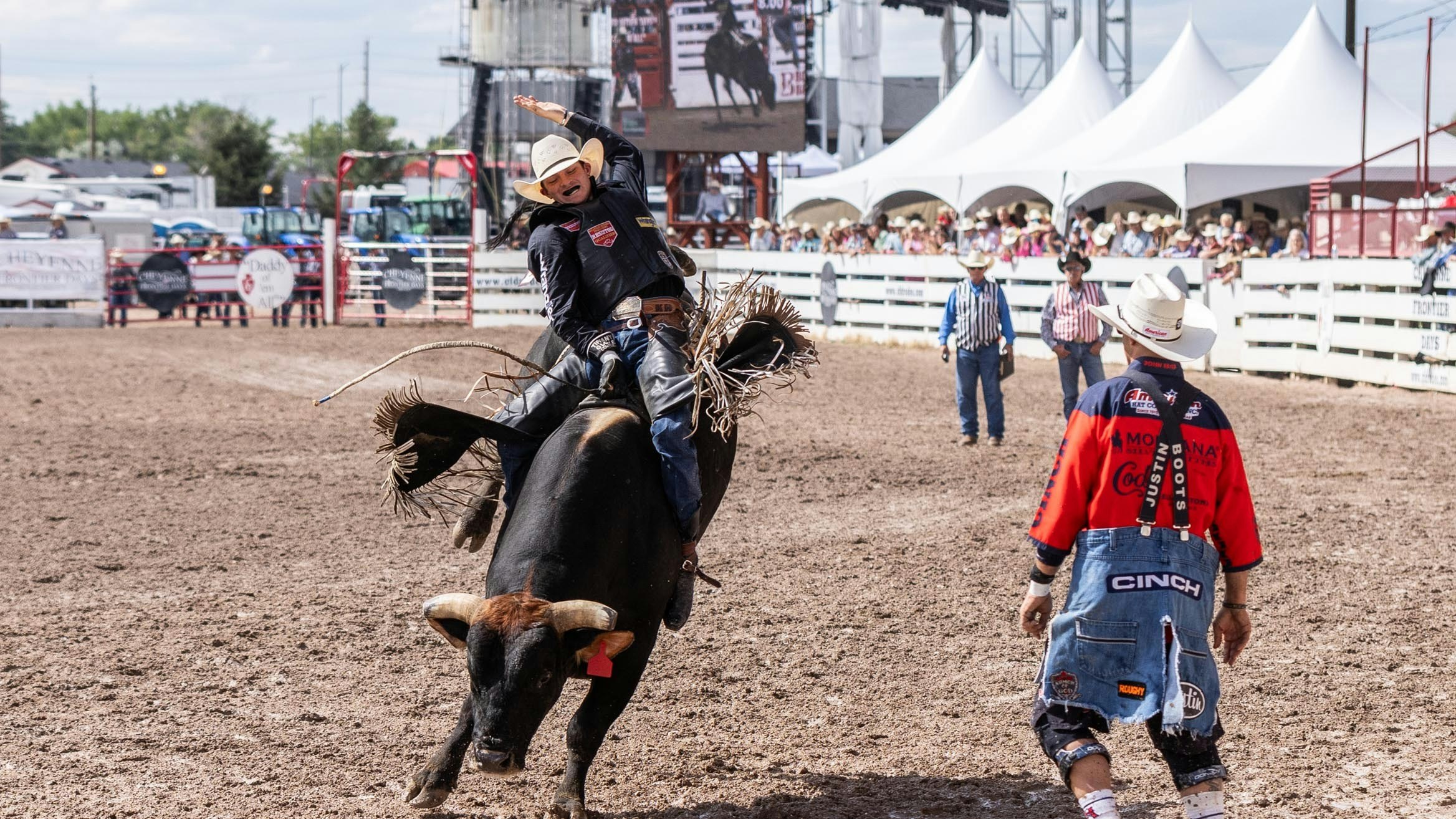 KY Hamilton from Mackay, Australia rides his bull for a score of 87 points at Cheyenne Frontier Days on July 26, 2023.