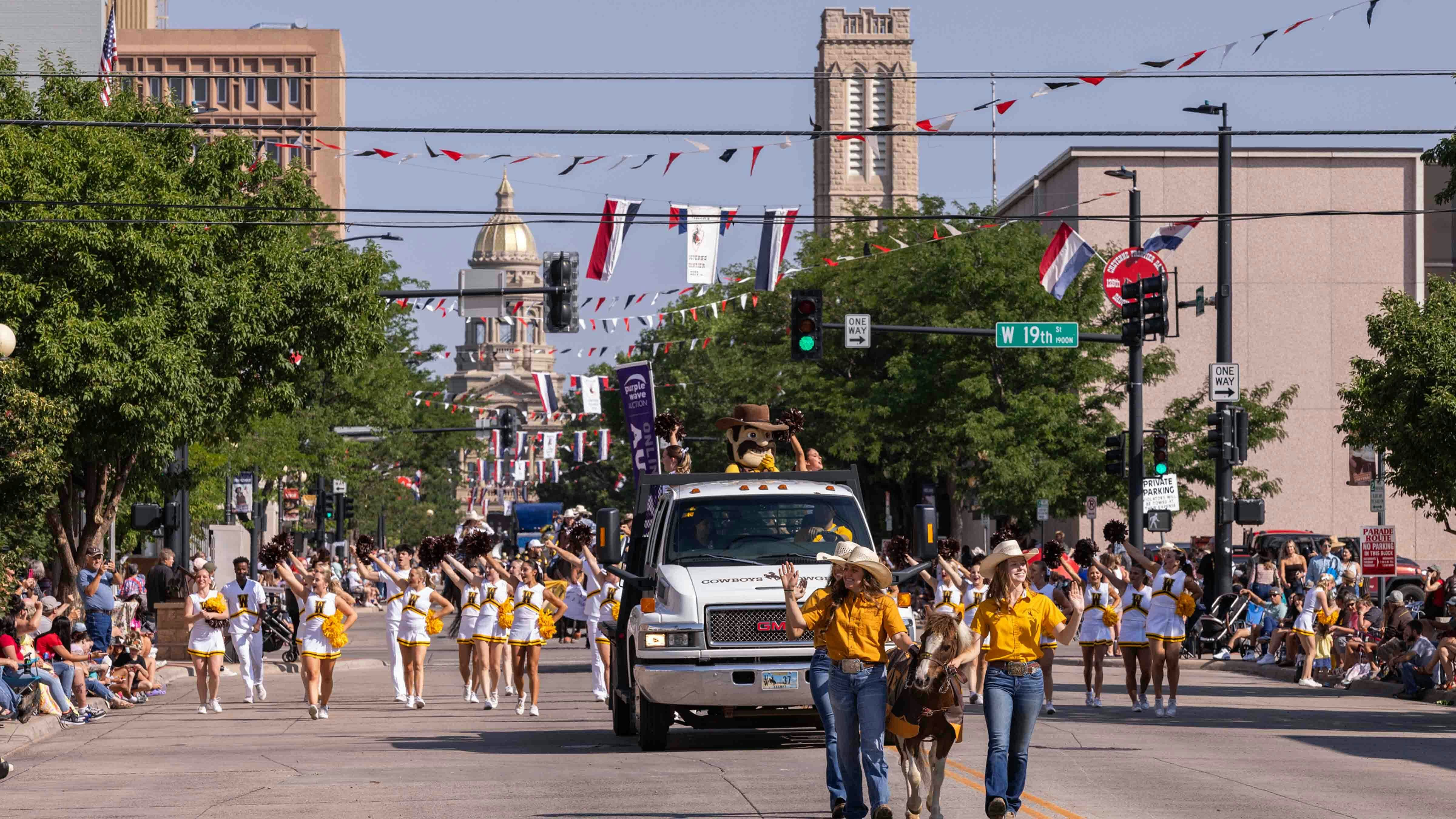 The University of Wyoming Athletics and Cheerleaders at the first parade at Cheyenne Frontier Days on July 20, 2024.