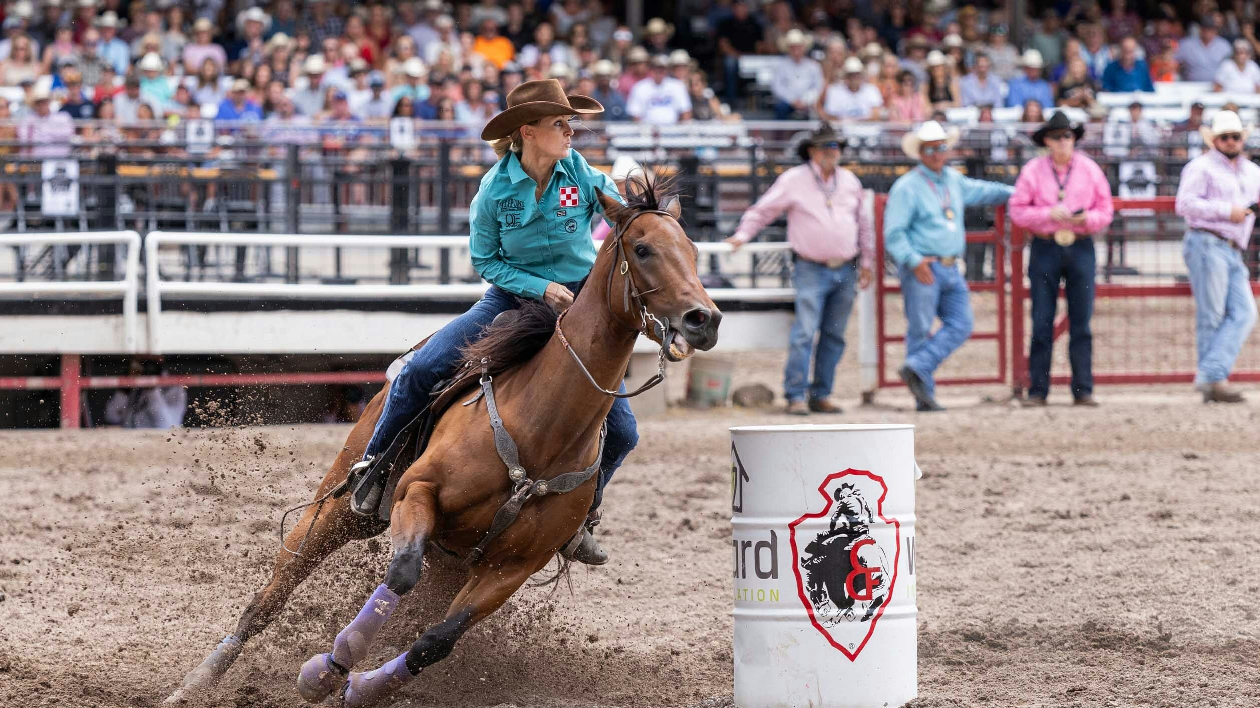 Wenda Johnson from Pawhuska, OK in the barrel racing at Cheyenne Frontier Days on July 27, 2023.