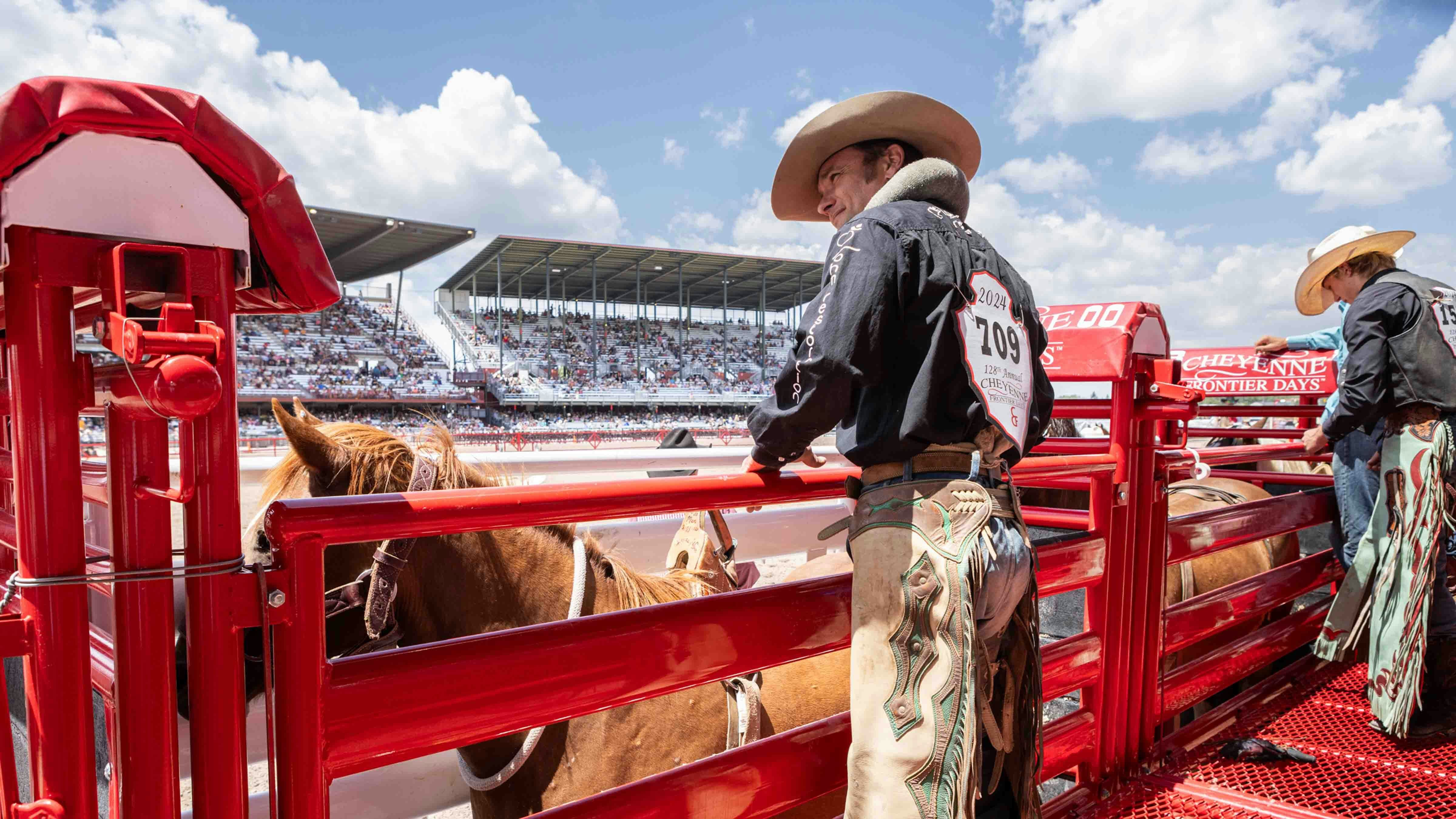 Will Lowe from Amarillo, TX in the bareback riding at Cheyenne Frontier Days on July 20, 2024.