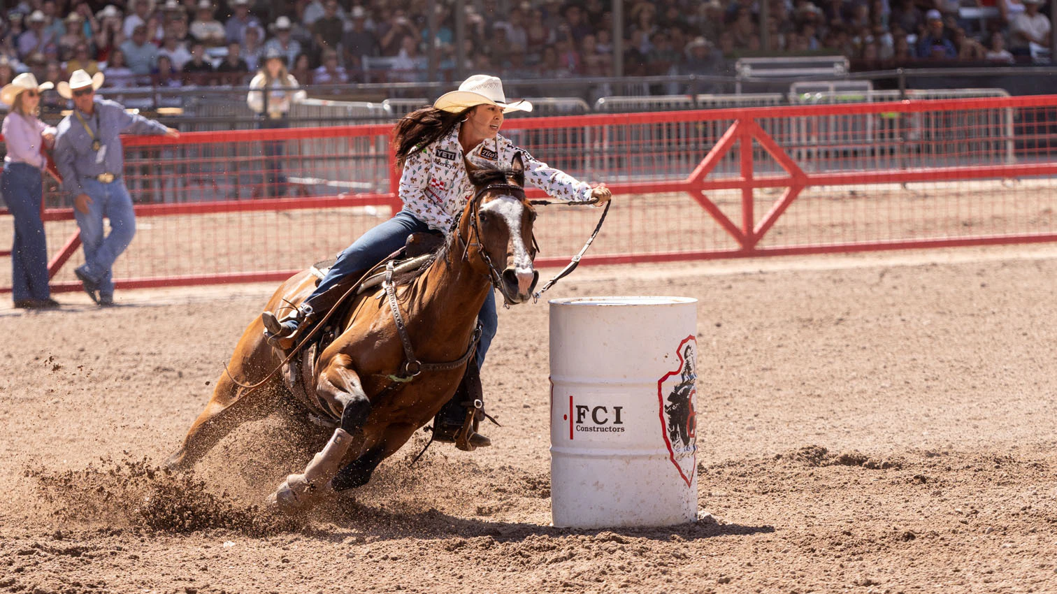 Hailey Kinsel from Cotulla, TX in the barrel racing at the rodeo at Cheyenne Frontier Days on Friday, July 24.