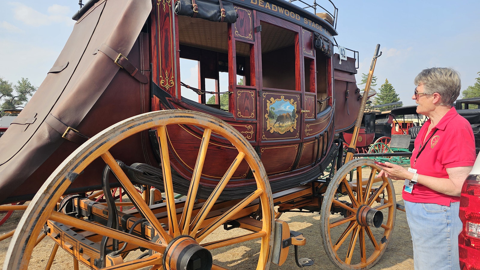 Mary Hartman helps keep track of the history of each of Cheyenne's unique historical carriages. This particular one is a replica of the Cheyenne-Deadwood Stage used for parades. The original is only displayed in the museum.