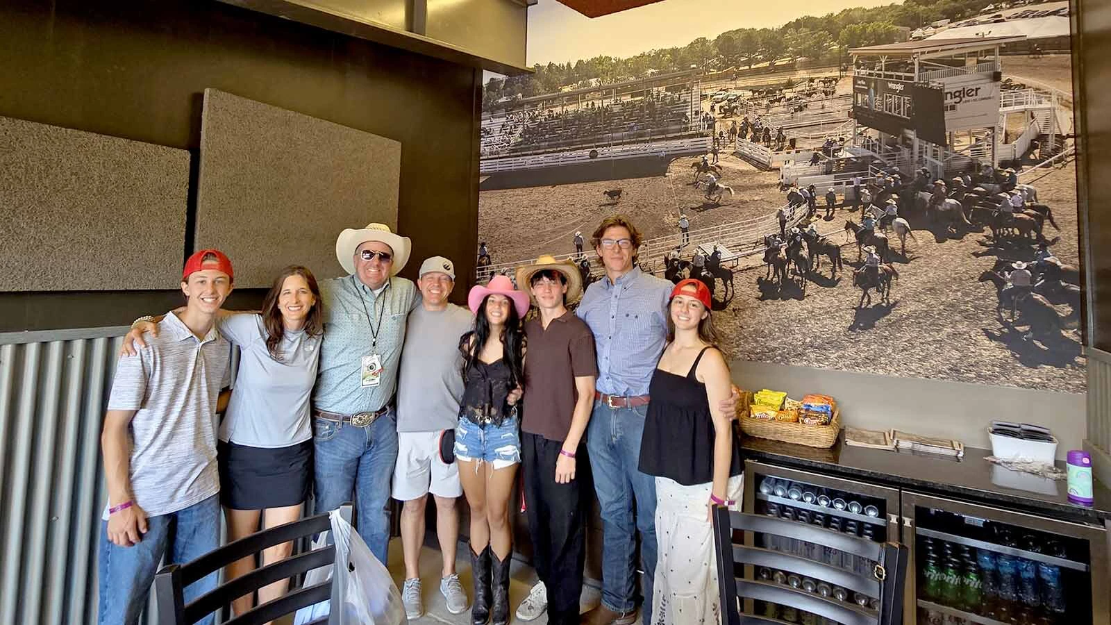 Nate Janousek, third from left, with his family, enjoyed their skybox experience in a private party room above Chute 9.