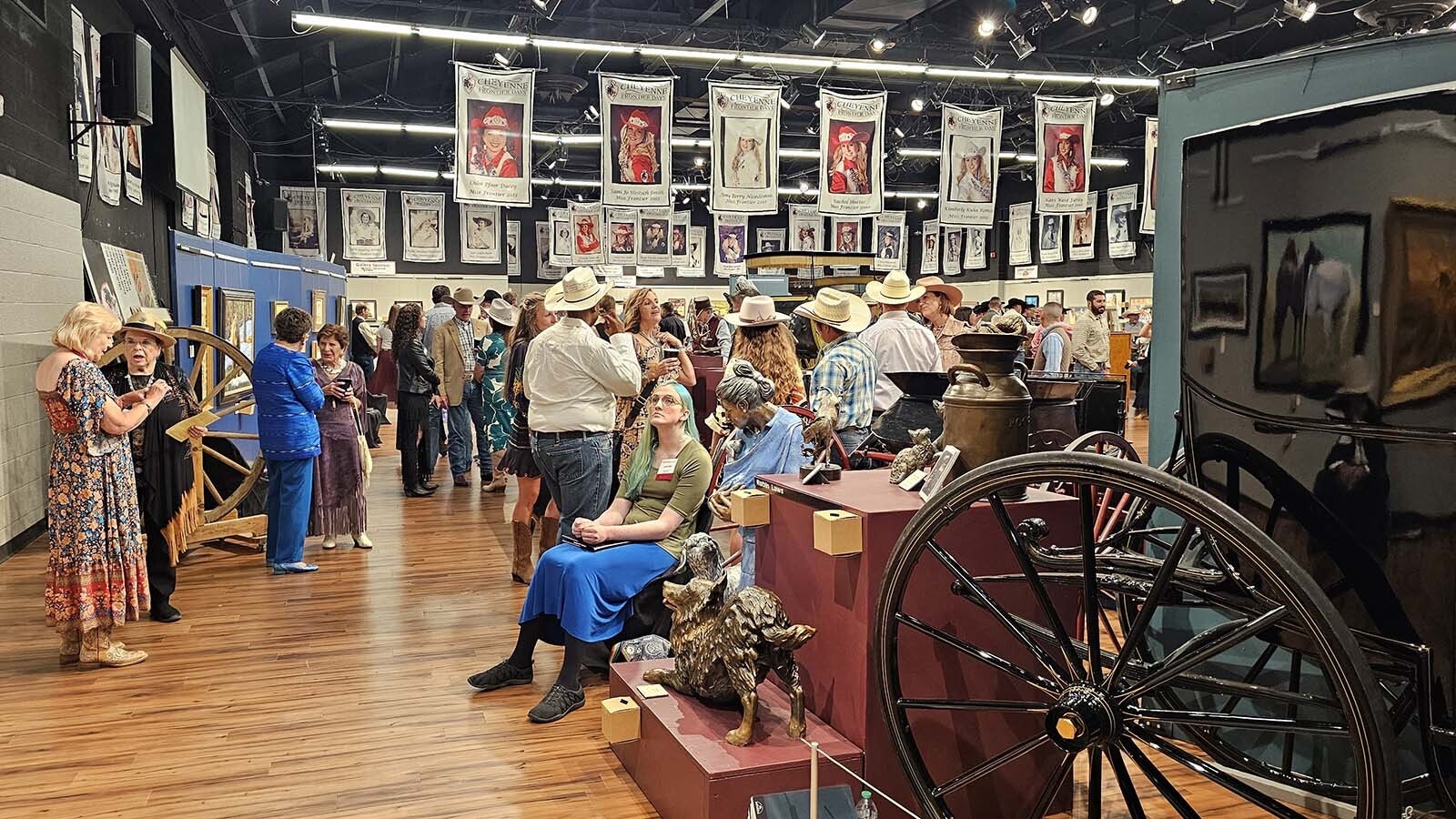 The crowd finally starts to thin out after 8 p.m. at the Cheyenne Frontier Days Western Art Show, but is still chock full of people, networking and enjoying art inspired by authentic western culture.