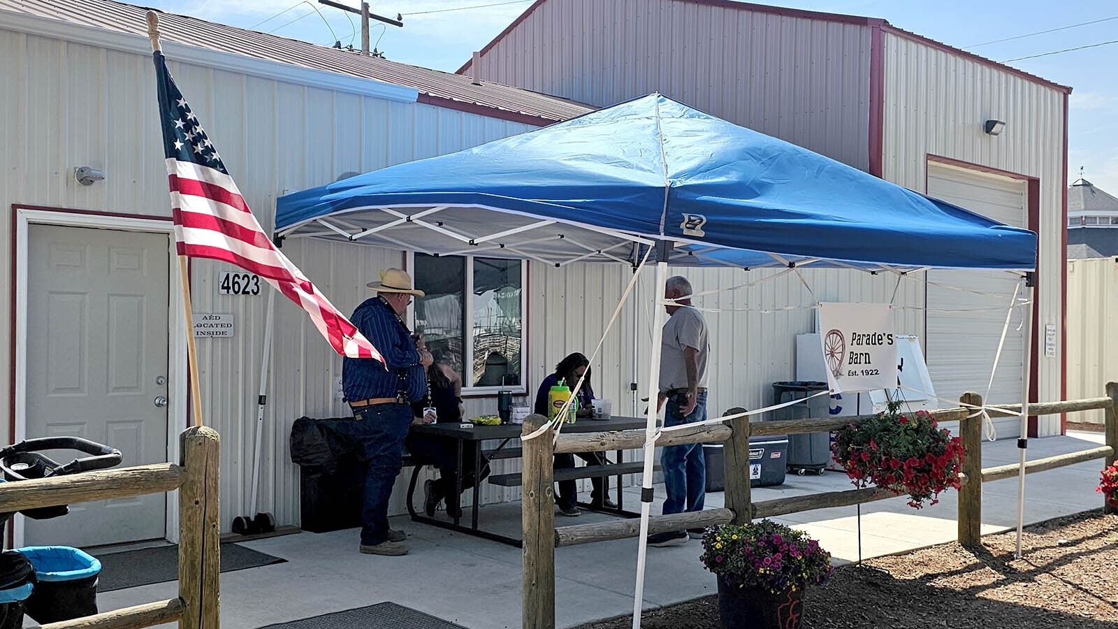 Lynn McColl, left, talks with fellow volunteers at the parades committee cabin at Cheyenne Frontier Days.