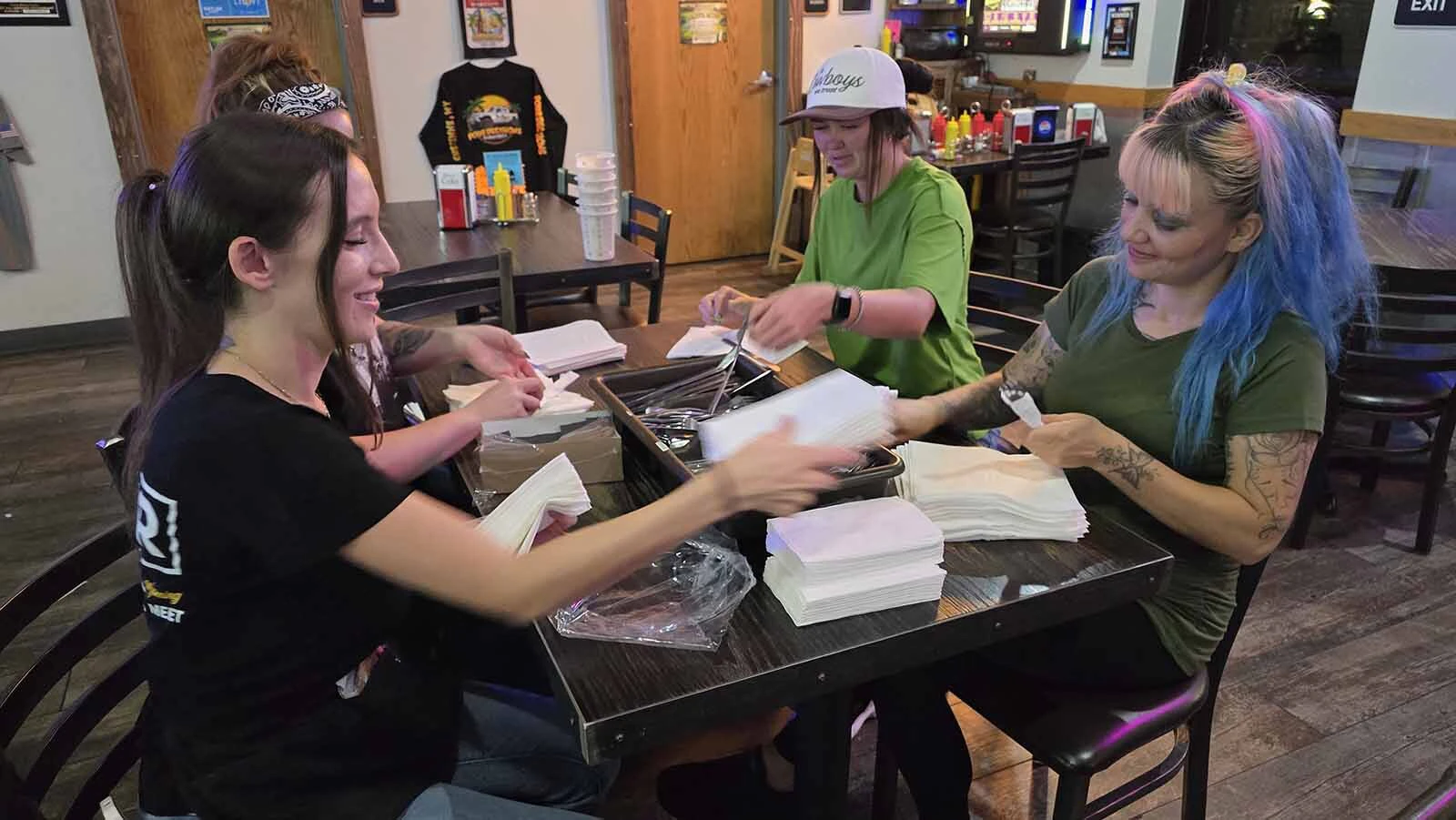 Waitresses at Pour Decisions had to roll up more than 1,000 pairs of silverware after the 4 to 9 p.m. dinner rush. They did 50% ore business than usual one waitress said.
