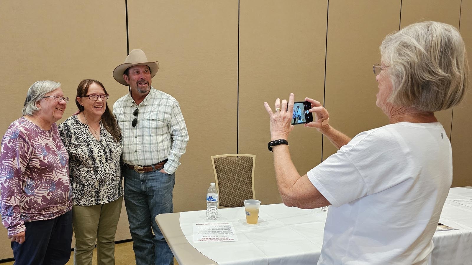 C.J. Box poses for a selfie with some fans in Saratoga, Wyoming.