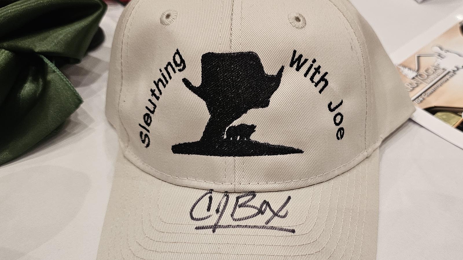 A Sleuthing With Joe Pickett hat signed by CJ Box.