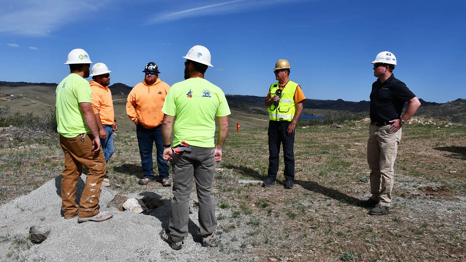 Technicians with Buckley Powder Co., a Cheyenne-based explosives service company that blasts rock in quarries, helped perform seismic tests on land near Curt Gowdy State Park that U.S. Gold Corp. wants to mine for gold and copper. The technicians just loaded a 50-foot hole with explosives and are preparing for a test they performed in 2022.