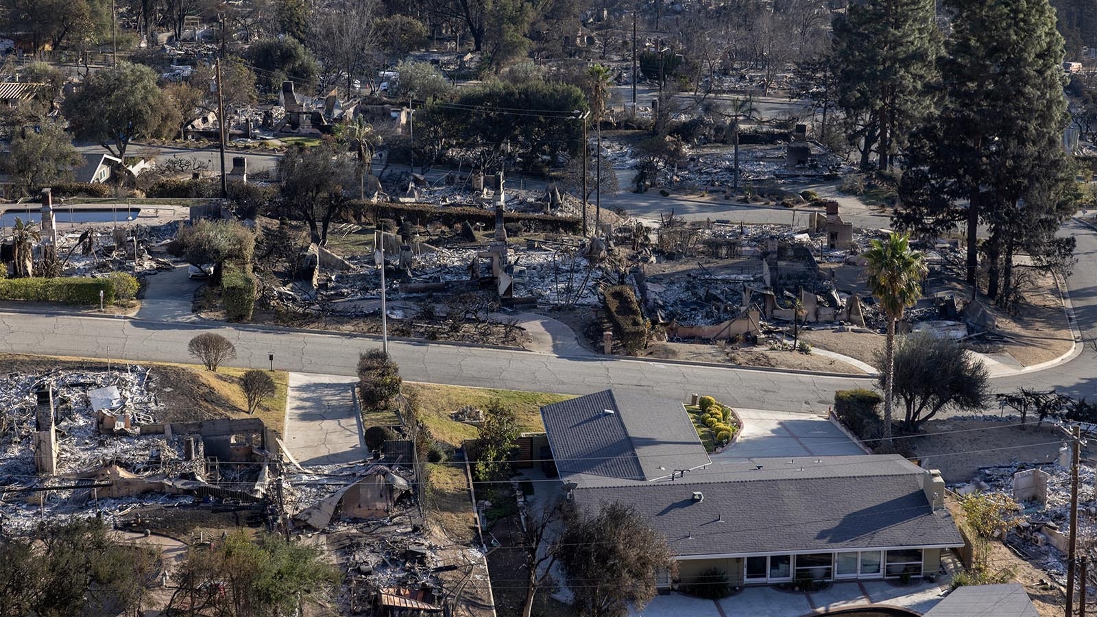 A neighborhood is reduced to rubble after burning in the Eaton Fire on Jan. 16, 2025 in Altadena, California.