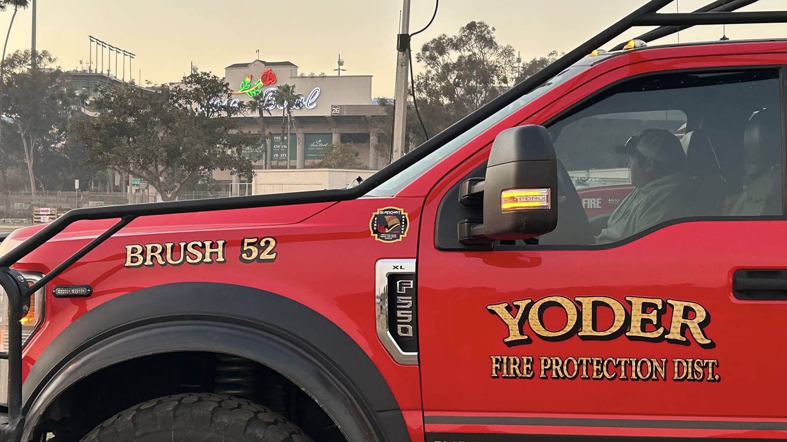 Brush 52 is one of a pair of trucks the Yoder Fire Protection District has in Southern California to help fight devastating wildfires there. Some firefighting crews are camping out at the Rose Bowl.