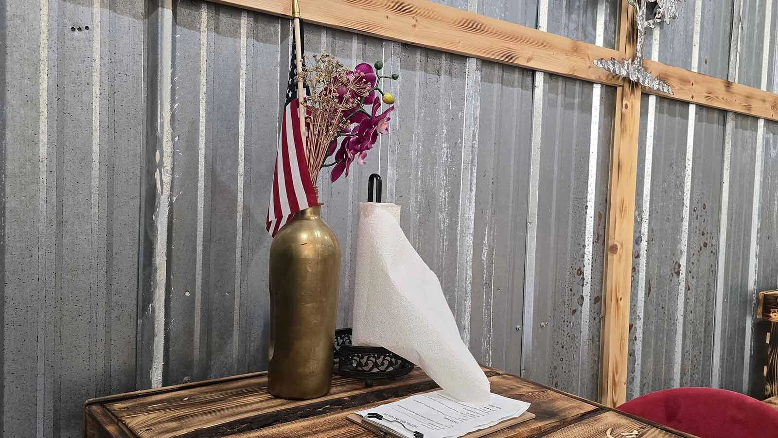 There's an American flag on every table at On-Site Laundry in Lander.