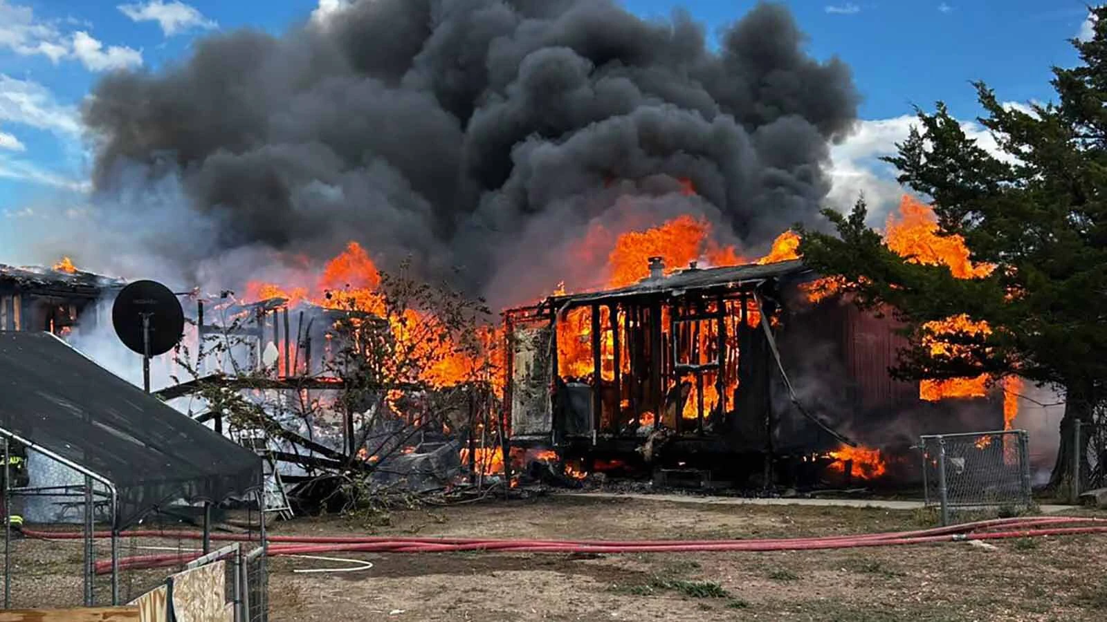 A Campbell County man was hospitalized with burns to his arms suffered while trying to rescue pets from an inferno that burned the family’s home to the ground Saturday.