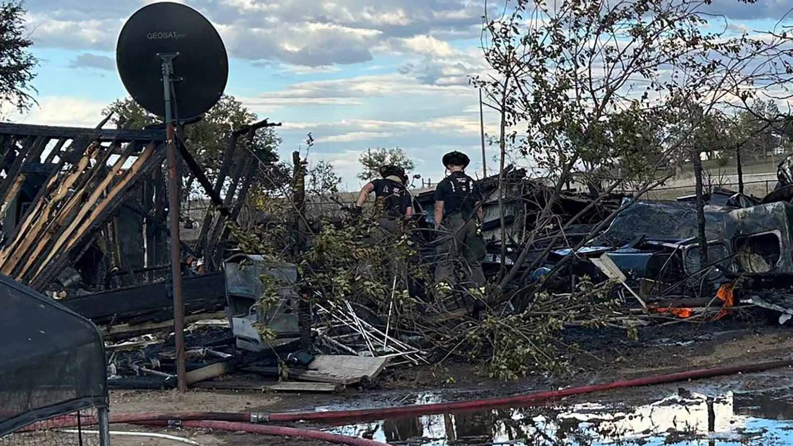 A Campbell County man was hospitalized with burns to his arms suffered while trying to rescue pets from an inferno that burned the family’s home to the ground Saturday.