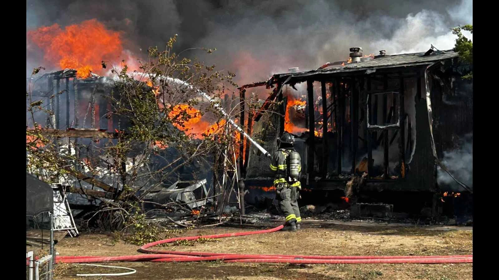 A Campbell County man was hospitalized with burns to his arms suffered while trying to rescue pets from an inferno that burned the family’s home to the ground Saturday.