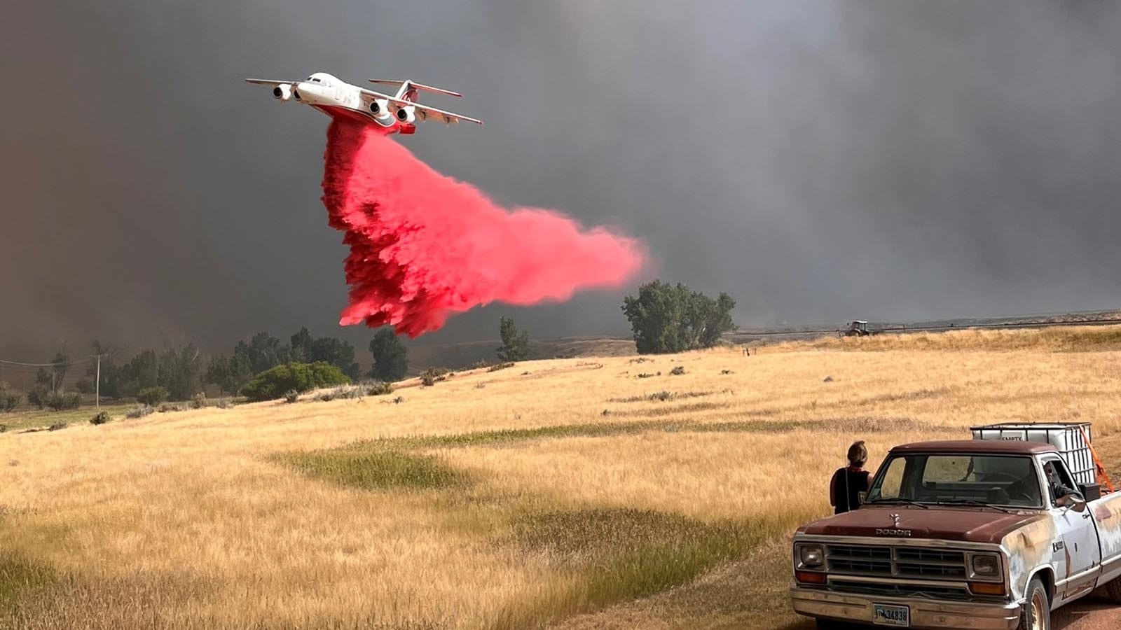 Large air tankers have been busy dropping fire retardant slurry on Wyoming's large wildfires.