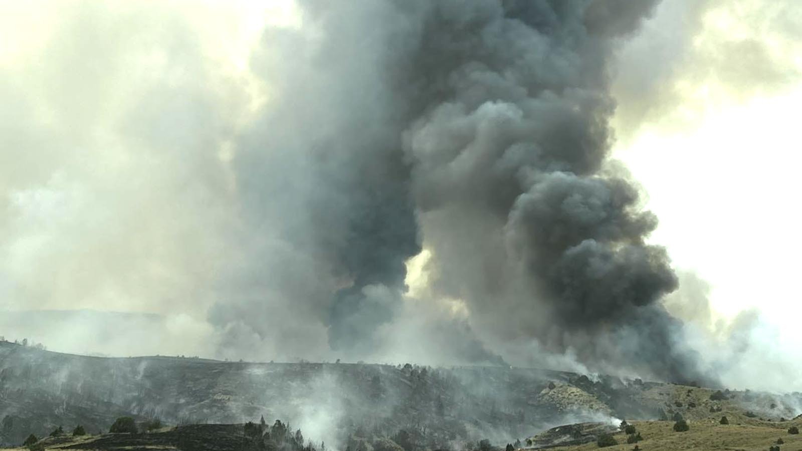 Huge plumes of smoke rise from the grasslands near Gillette in Campbell County.