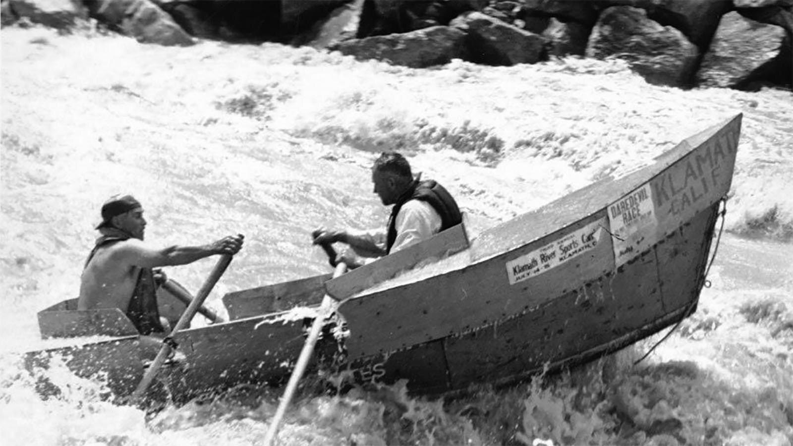 Slim Coats and Oscar Taylor race in the whitewater race through the Wind River Canyon.