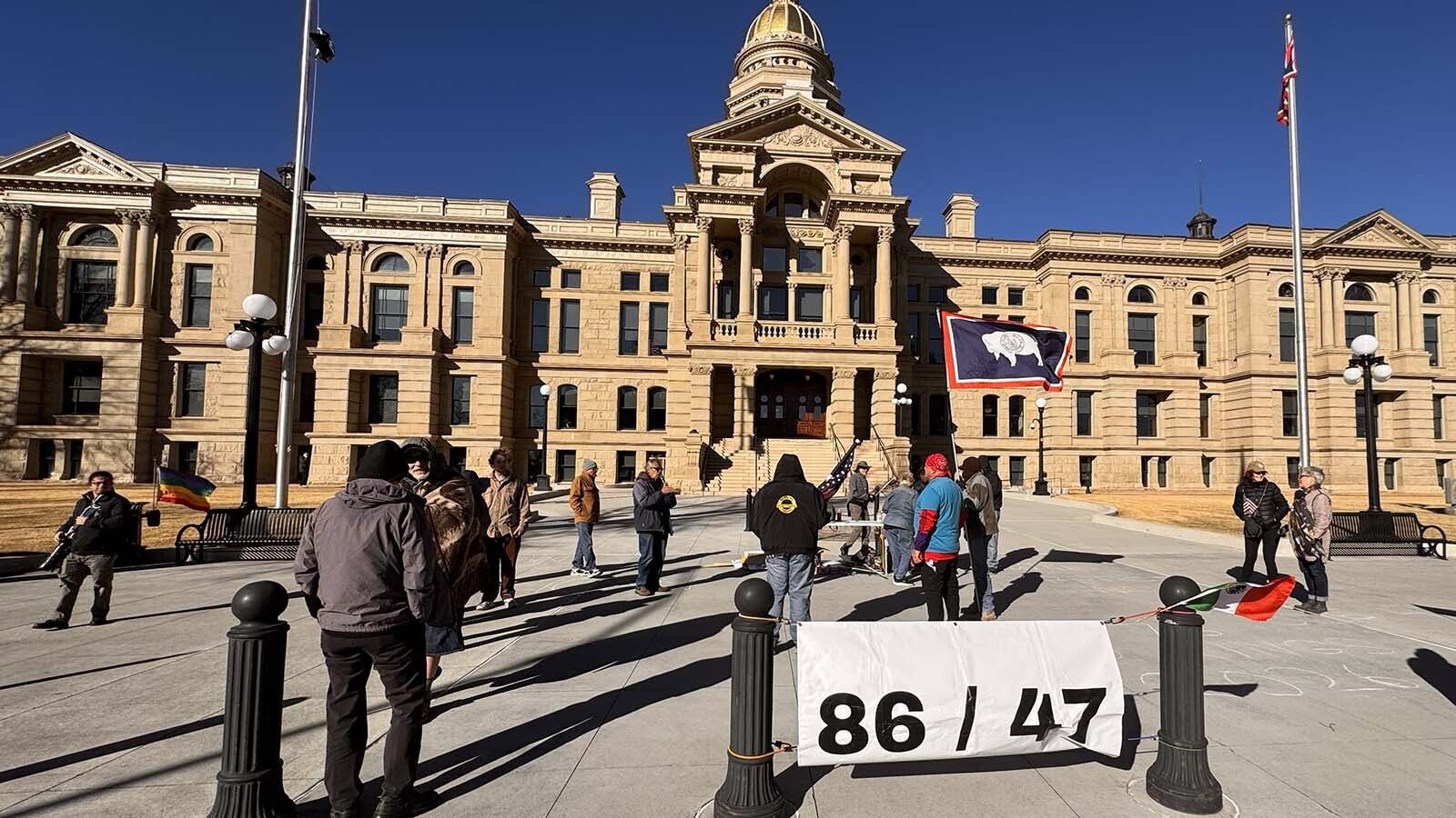 An small, loosely organized “86/47” demonstration at the Wyoming Capitol against President Donald Trump on the anniversary of Jan. 6, 2021, turned into a buffet-style protest Tuesday. Also targeted were Republicans and the U.S. incursion into Venezuela.