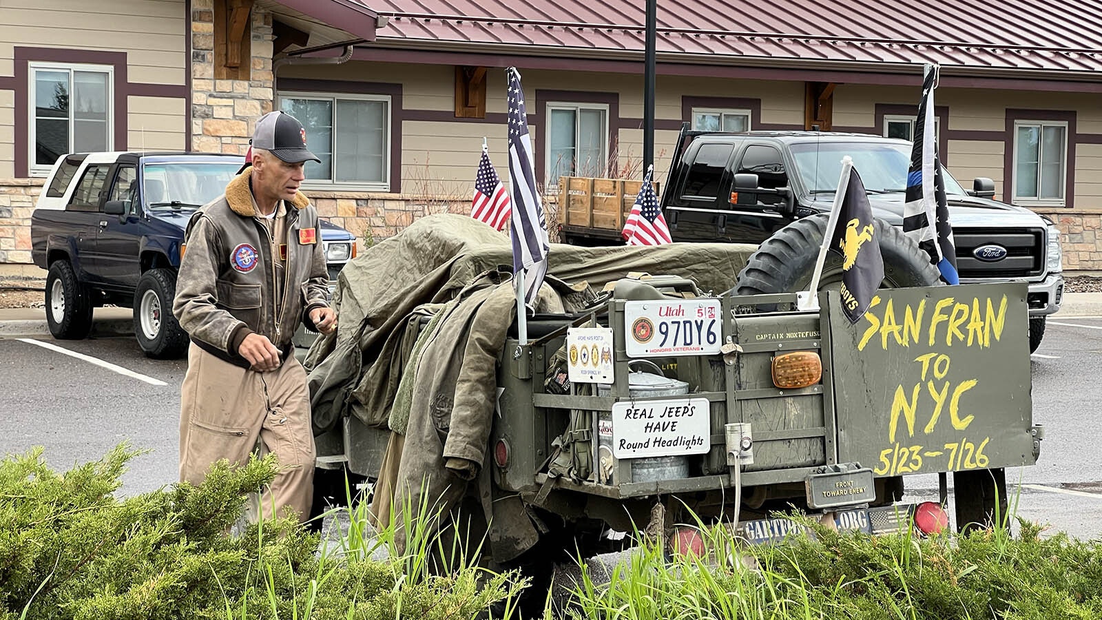 Capt. Scott Montefusco secures Little Glory, his 1952 Willys Jeep, after rolling into Laramie recently.