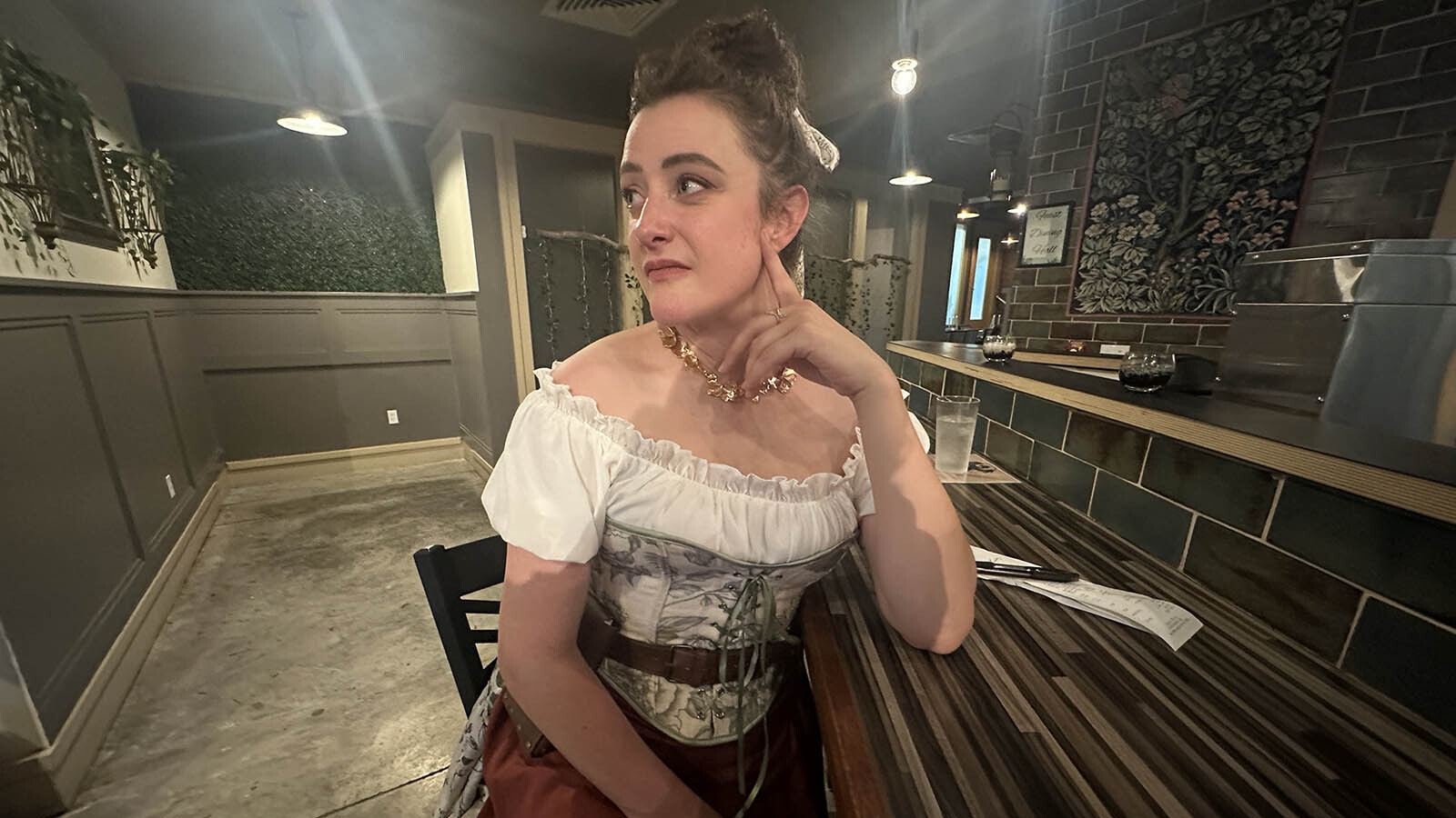Kate Restad slips into the character of Eleanor when waiting tables.