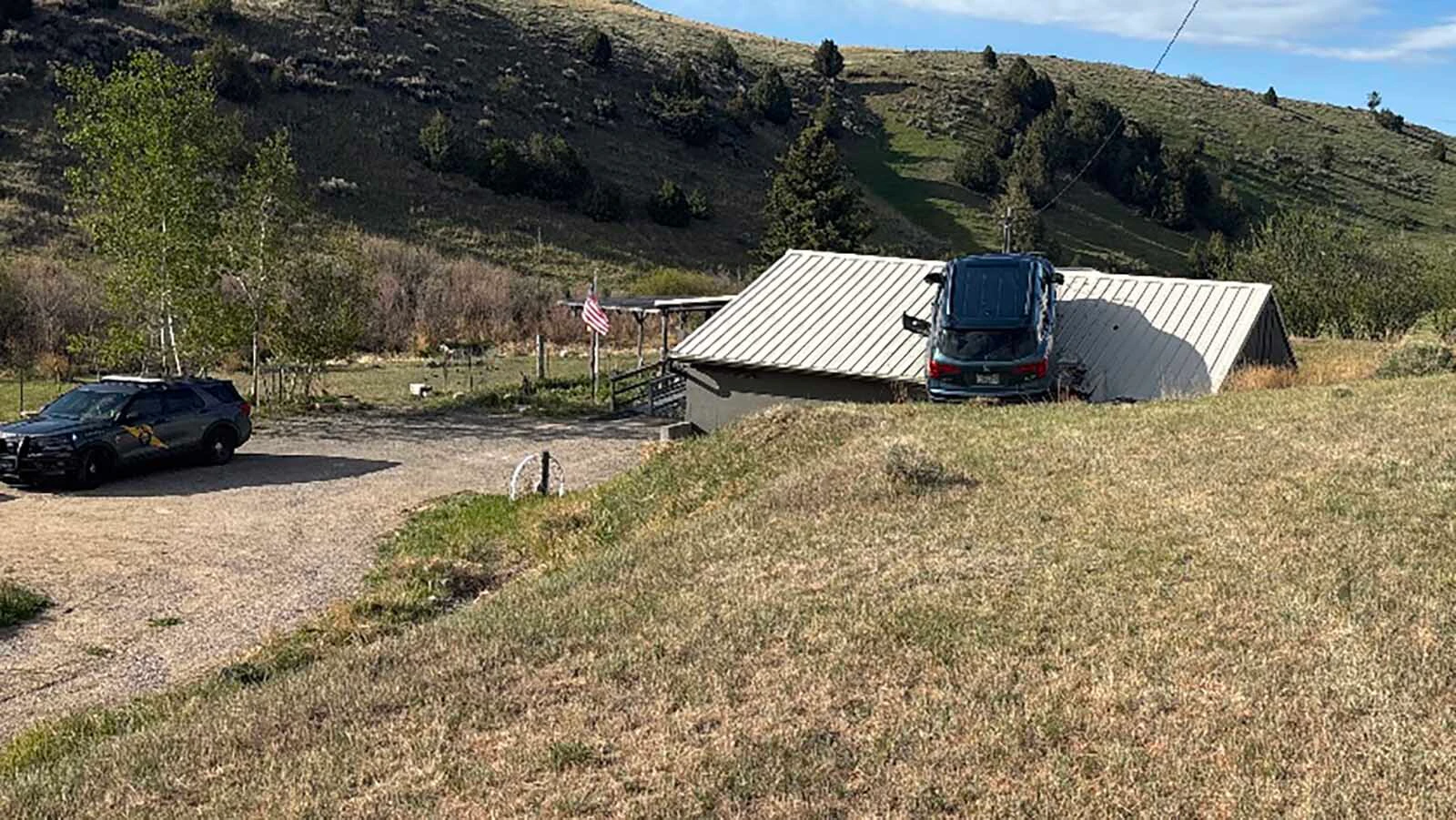The Montana Department of Transportation had to rescue a driver from an SUV that crashed through a guardrail, toppled down an embankment and landed on the roof of a garage this week. Most people, however, say the real hero is the garage roof.
