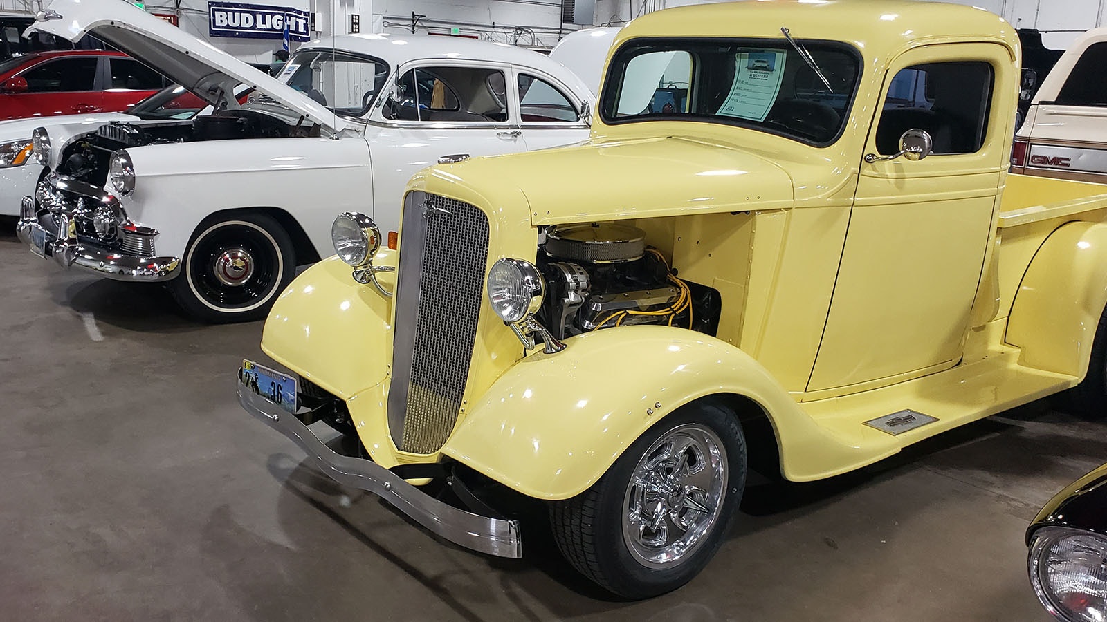 A 1936 Chevy truck with the engine showing.