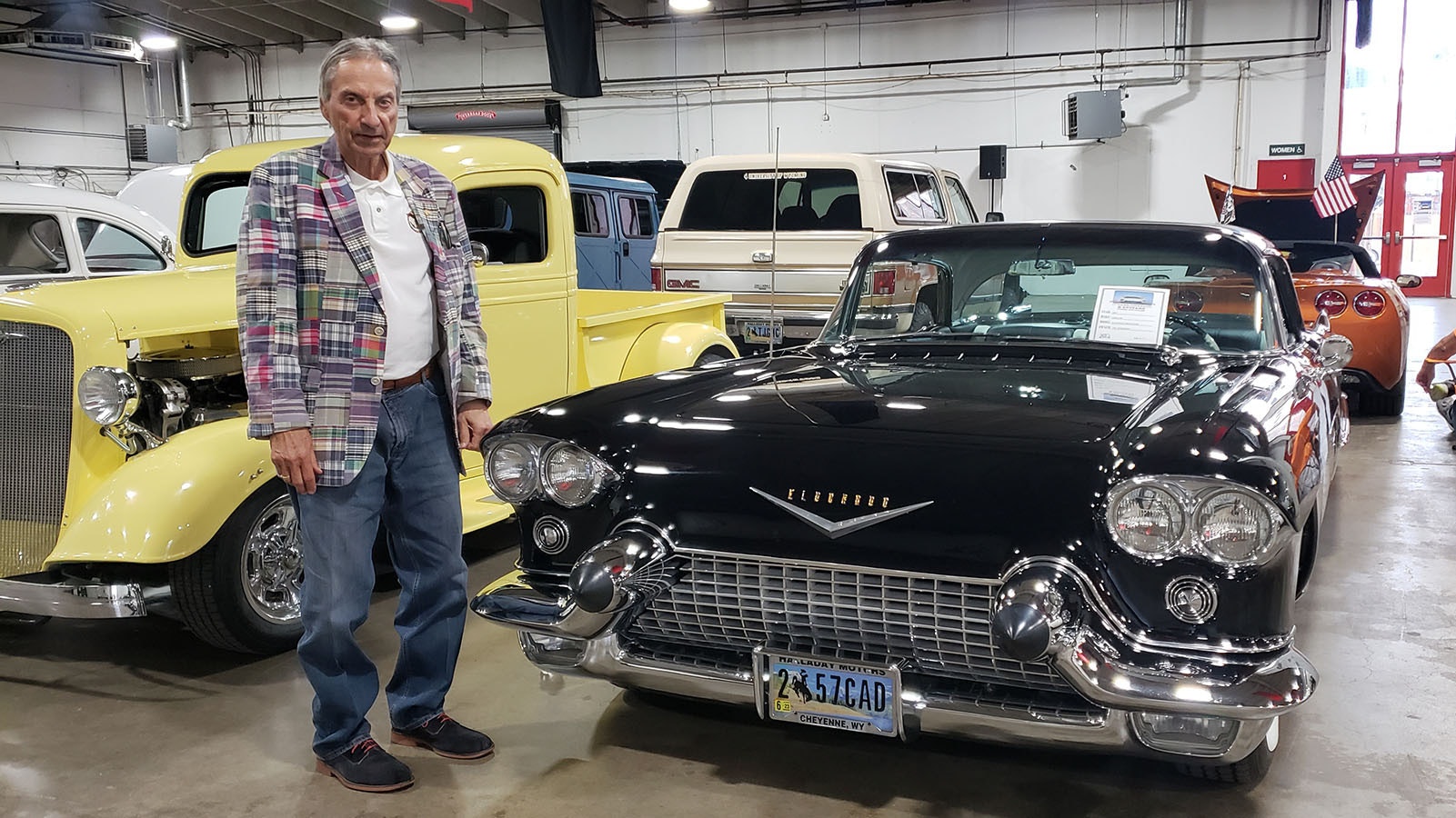 Cars Guitars and Cigars organizer Timothy Joannides poses with his 1957 Cadillac Eldorado Brougham. Only 400 like it were made.