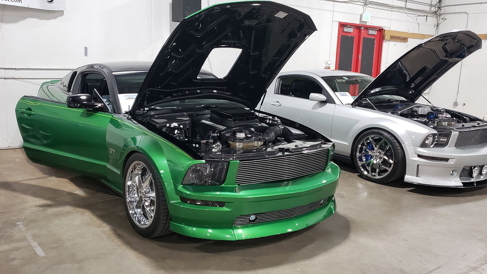 Sins of Envy is a 2007 green Mustang with a shaker engine and chrome wheels.