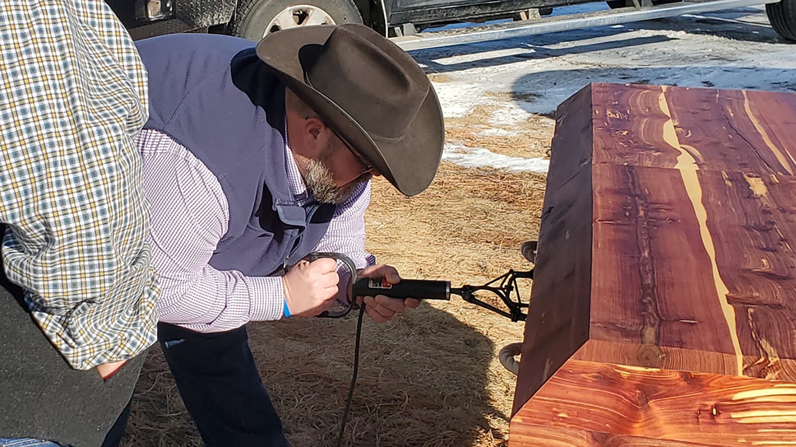 A growing trend in Western funerals is for family and loved ones to put hot cattle brands to wooden caskets. It’s the most cowboy way for ranching families and others in the West to say goodbye.