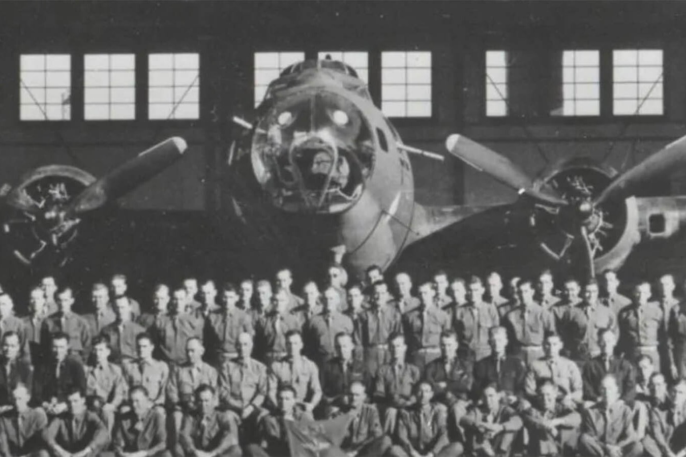A photo of flight crews outside a hangar at Casper Army Air Base.
